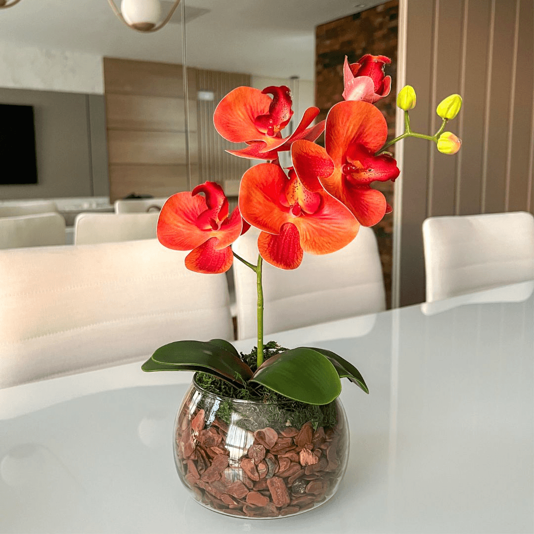 ARRANJO DE ORQUÍDEA LARANJA VASO DE VIDRO INCOLOR LUIS